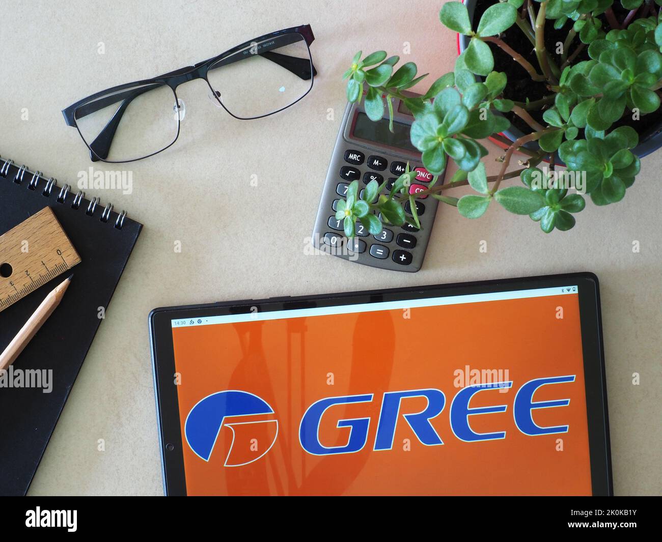 In this photo illustration, Gree Electric Appliances Inc. logo seen displayed on a tablet Stock Photo