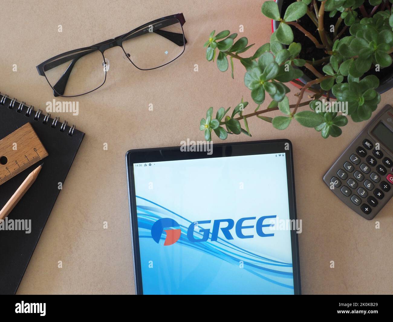 In this photo illustration, Gree Electric Appliances Inc. logo seen displayed on a tablet Stock Photo