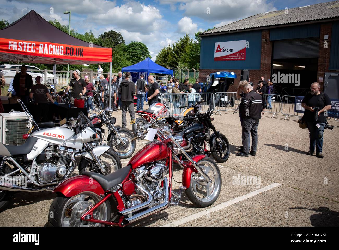 The admirers looking at powerful motorcycles at a show Stock Photo