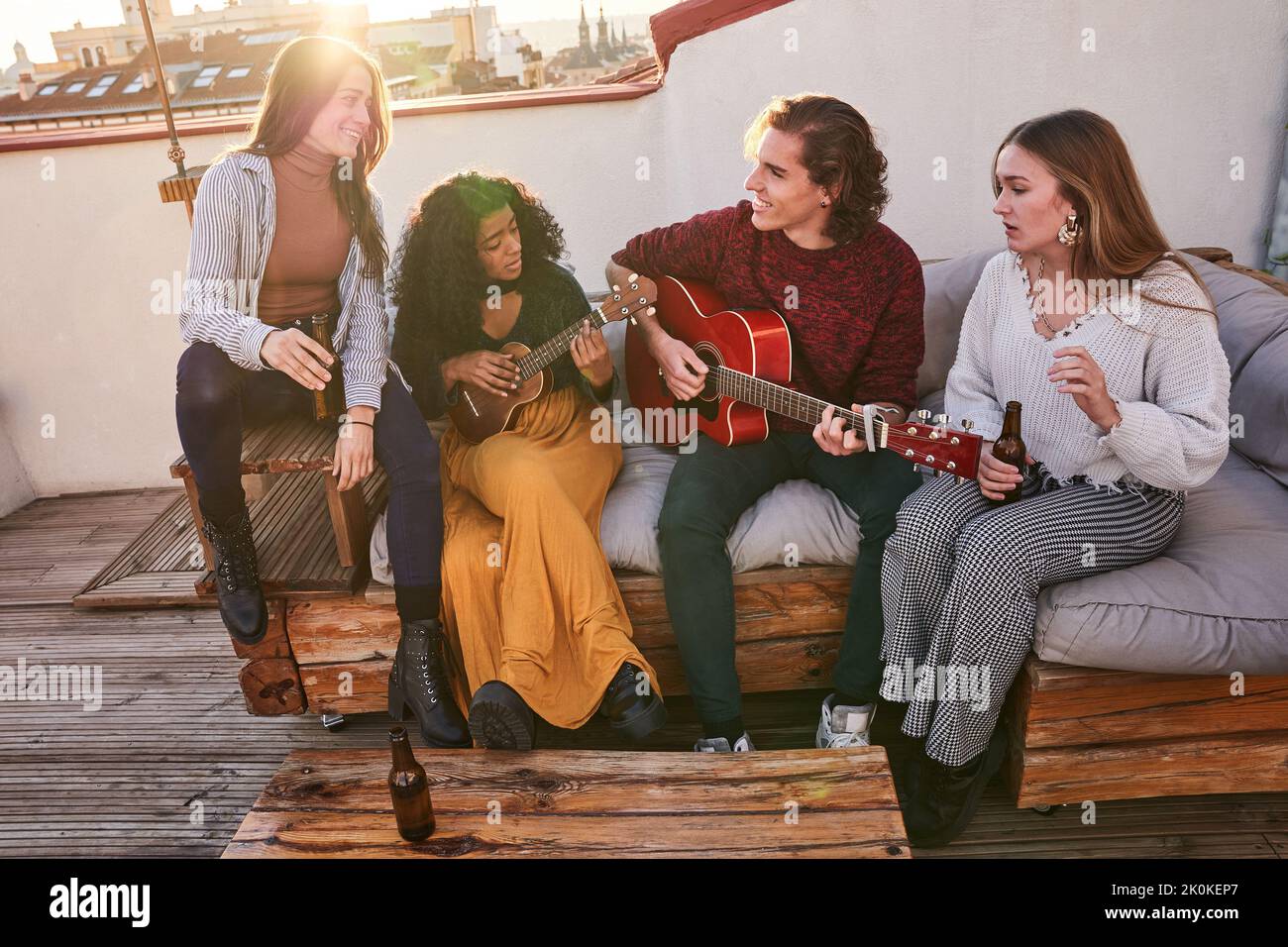 Multiracial friends guitarist resting on hi-res stock photography and ...