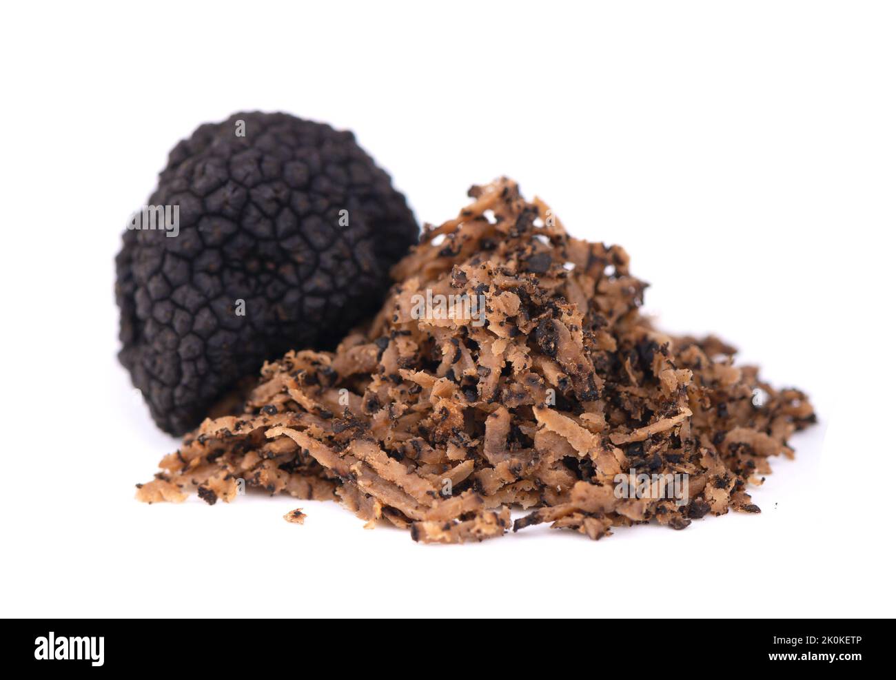 Black truffles isolated on a white background. Fresh sliced truffle. Delicacy exclusive truffle mushroom. Piquant and fragrant French delicacy. Clippi Stock Photo