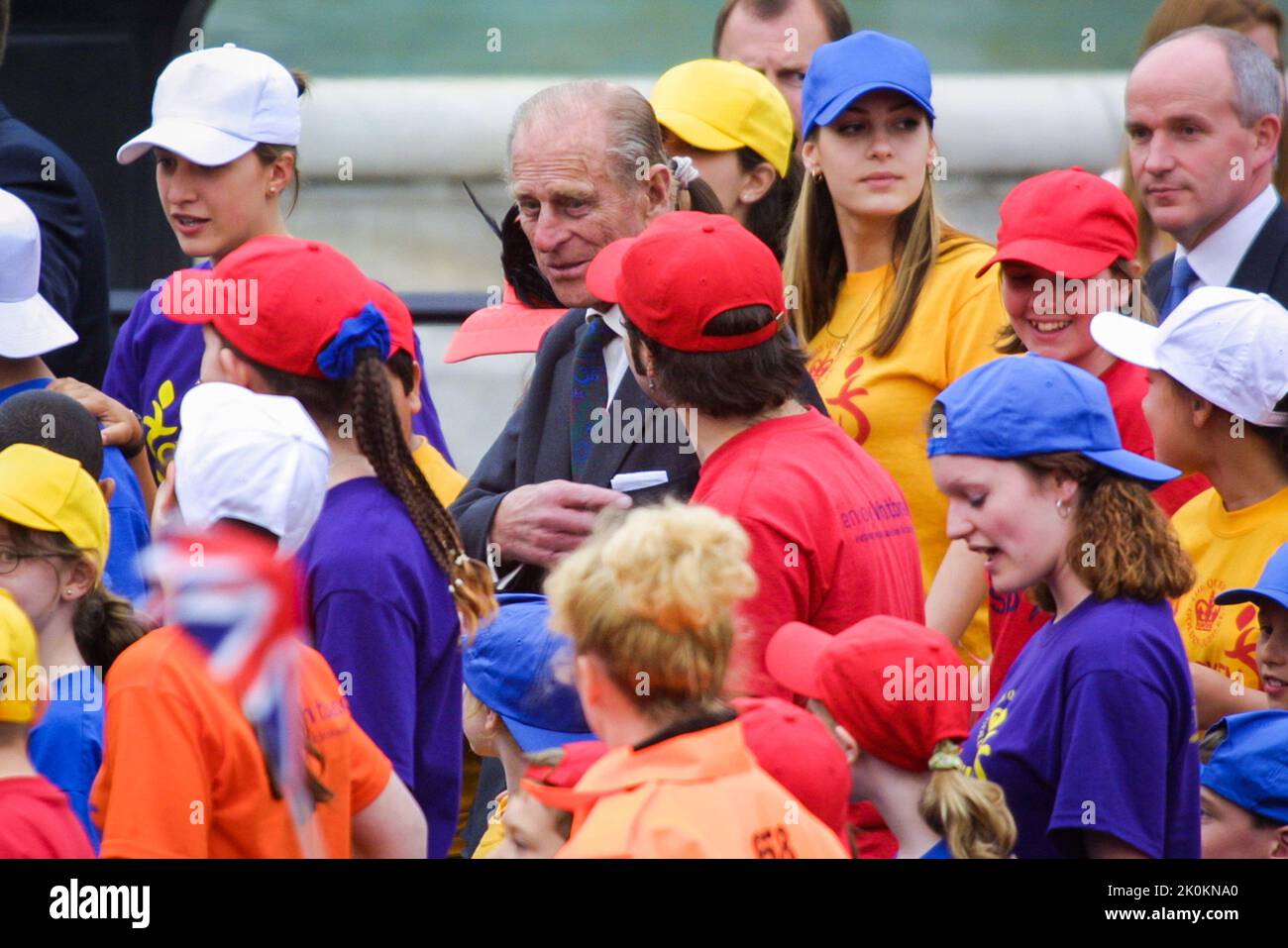4th June 2002 - Prince Philip and Queen Elizabeth II meet the Chicken Shed Theatre company kids at her Golden Jubilee celebration at Buckingham Palace in London Stock Photo