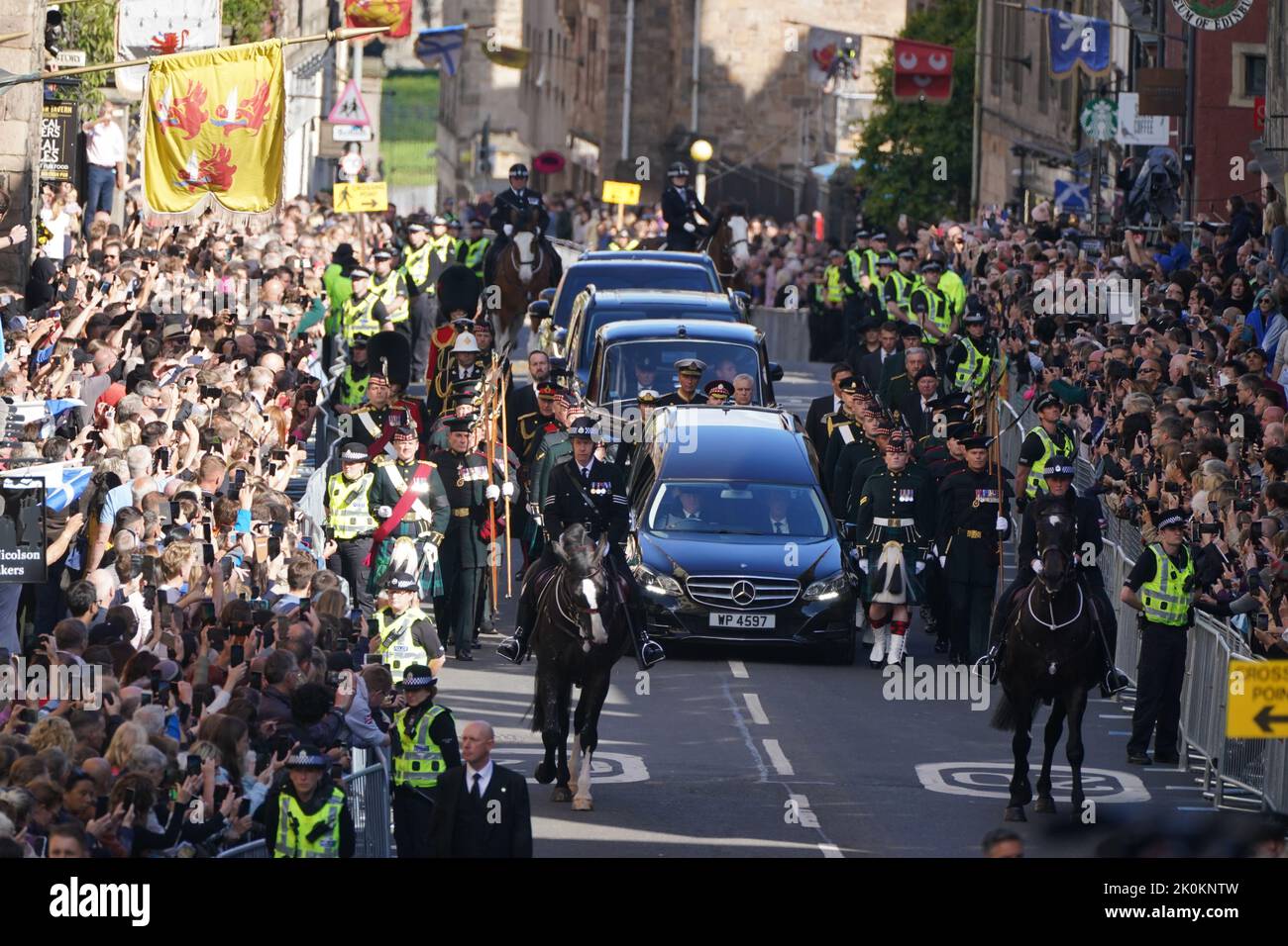 King Charles III and members of the royal family join the procession of