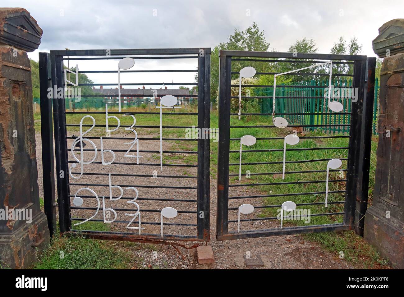 Playing field gates, with musical notes, on Penny Lane, Liverpool, Merseyside, England, UK, L18 1DE Stock Photo