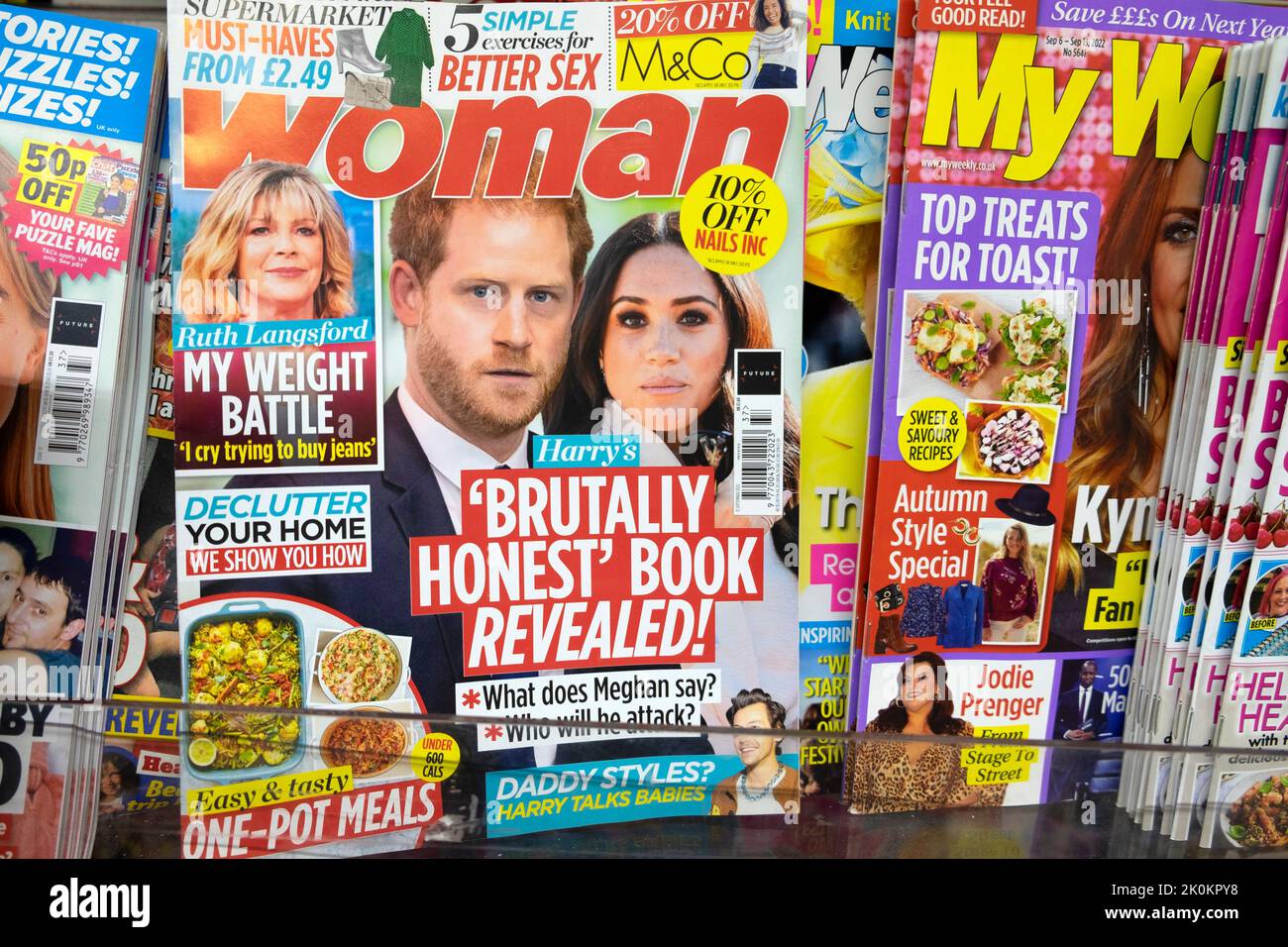 Prince Harry and Meghan Markle on the front cover of Woman magazine headline ' Harry's 'Brutally Honest' Book Revealed!' September 2022 UK Stock Photo
