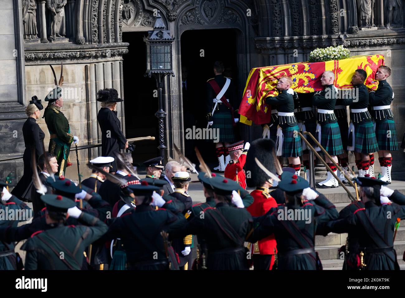 King Charles III joins the procession of Queen Elizabeth II coffin from