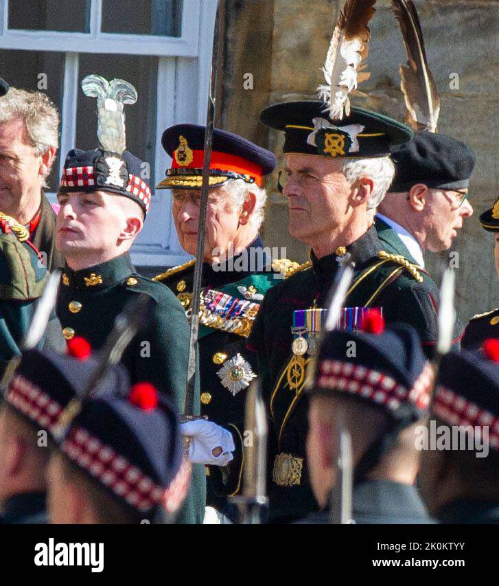 King Charles III, joins the procession of Queen Elizabeth II coffin