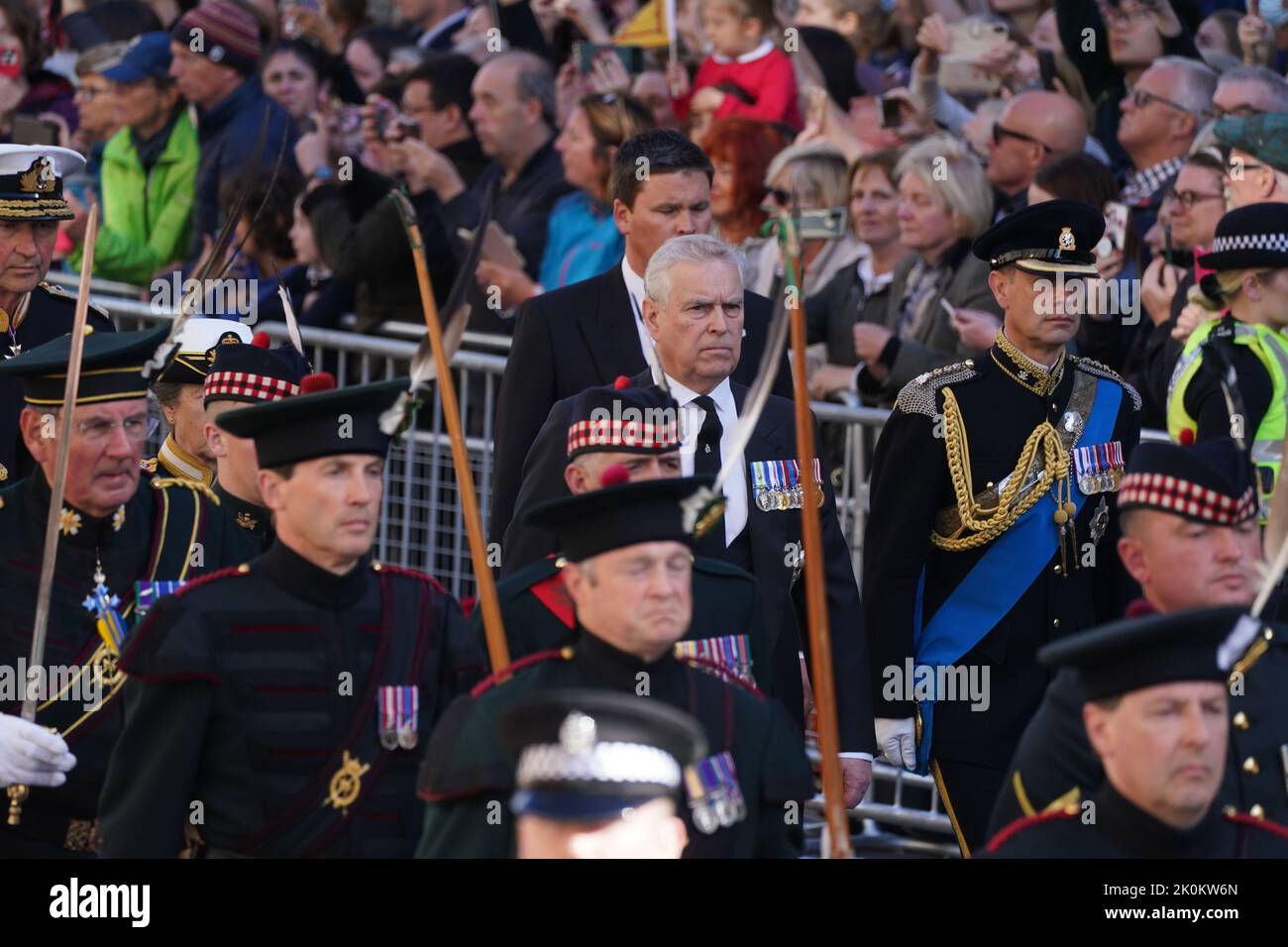 The Duke of York (centre) and the Earl of Wessex (right) walk behind
