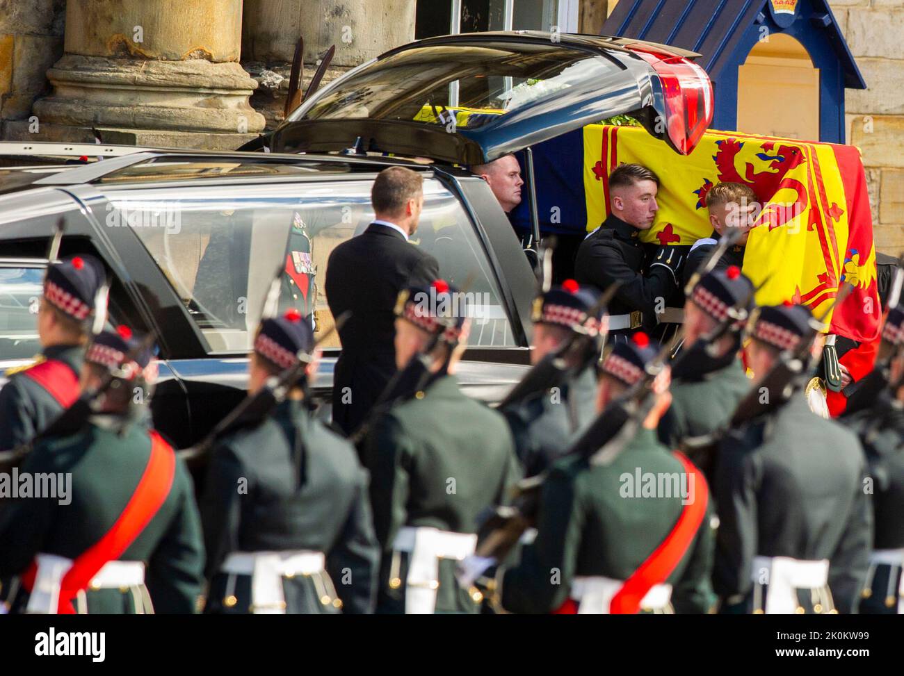 Royal guards carry Queen Elizabeth II's coffin at the start of the