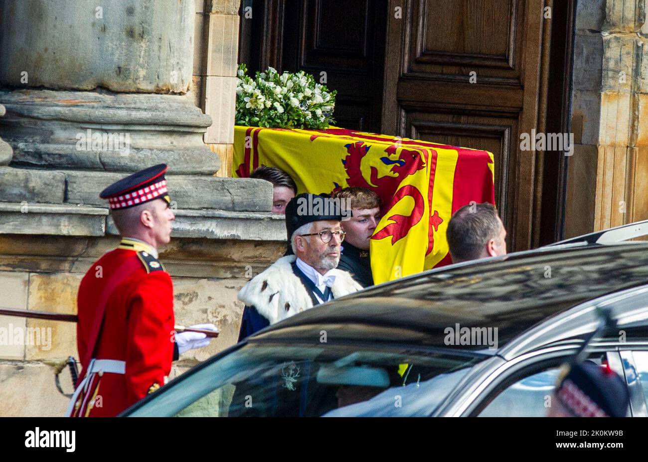 Royal guards carry Queen Elizabeth II's coffin at the start of the