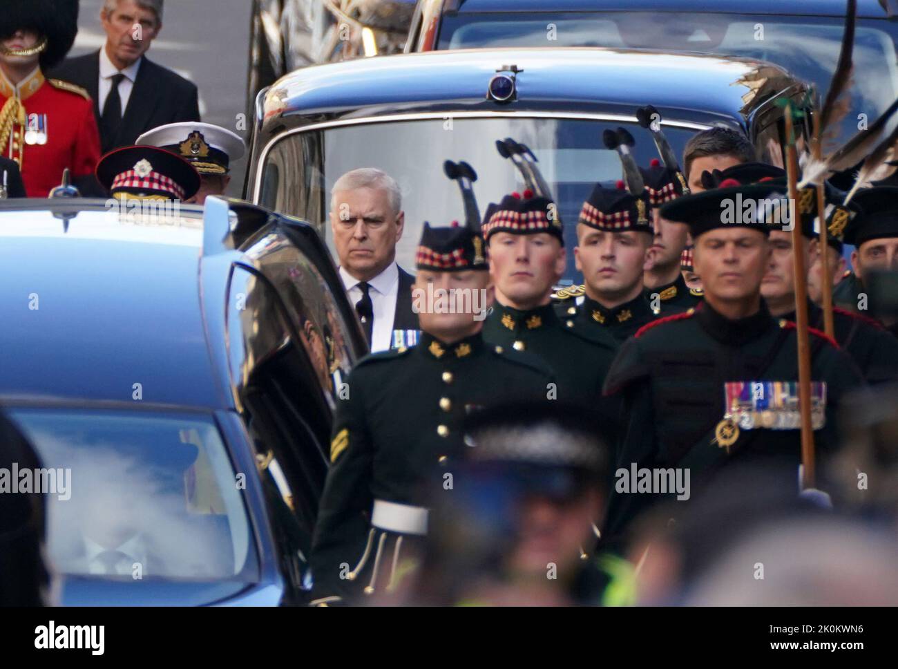 The Duke of York walks behind Queen Elizabeth II's coffin during a the