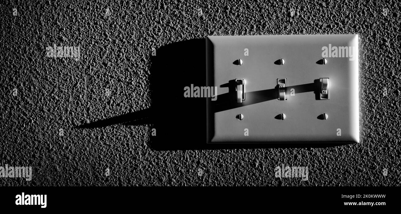 Closeup of light switch for turning on power to lamps Stock Photo