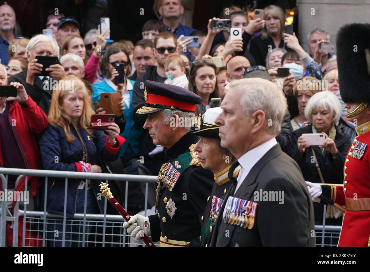 King Charles III and members of the royal family join the procession of