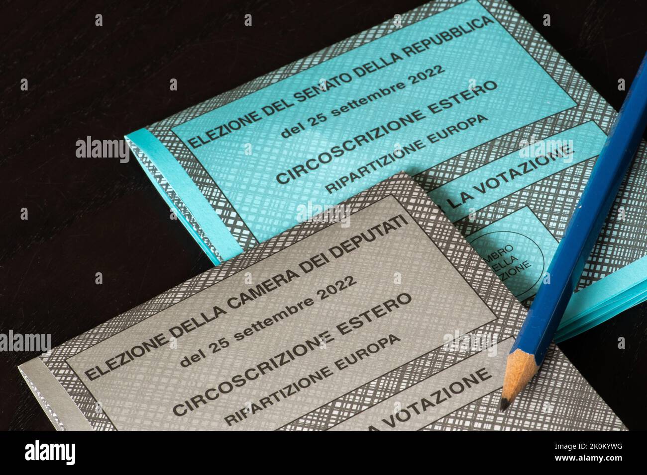 Italian general election 25 September 2022 for Chamber of Deputies and Senate of the Republic. Voting, ballot paper with pencil on a white background Stock Photo