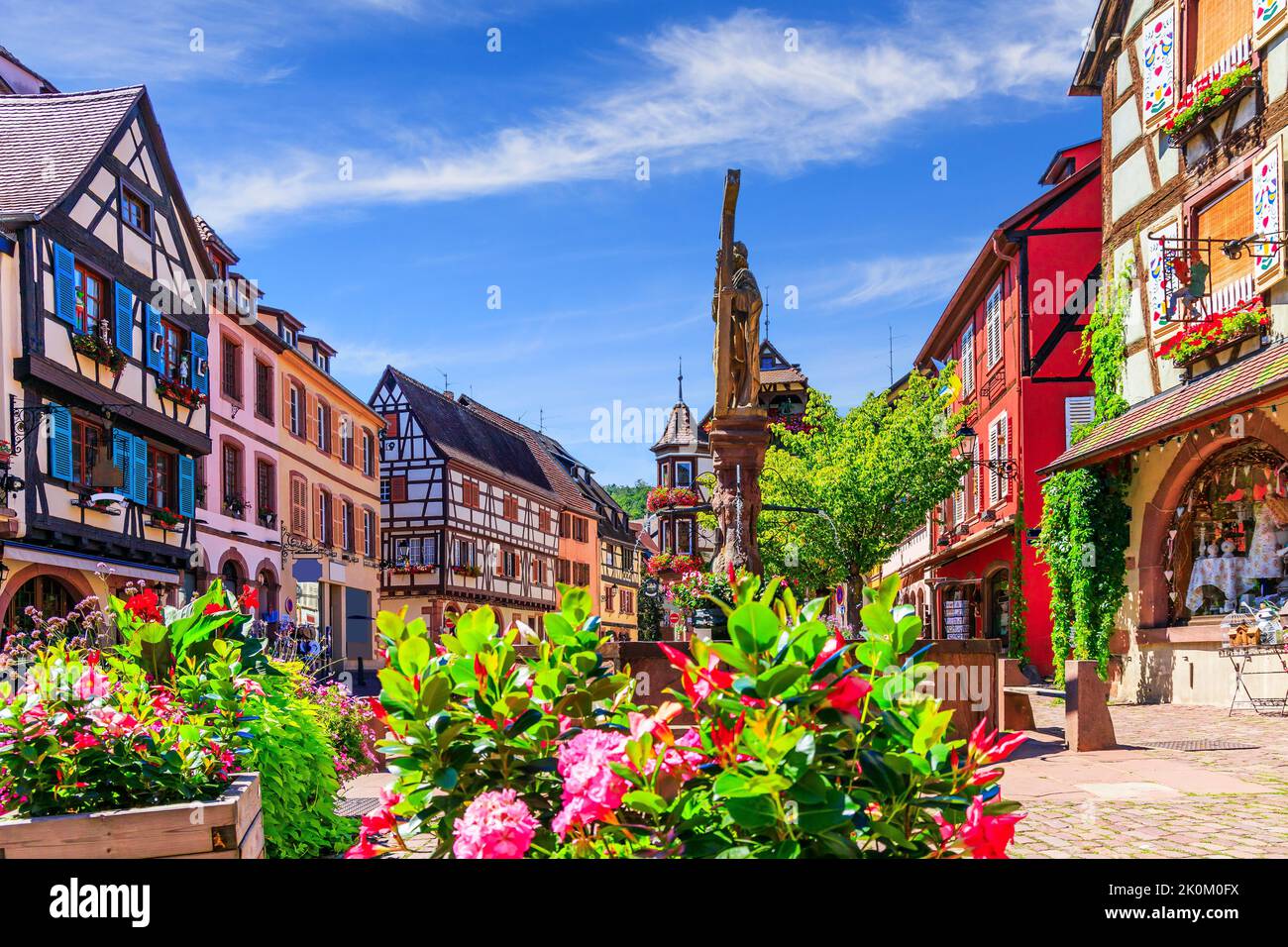 Kaysersberg Vignoble, France. Picturesque street with traditional half timbered houses on the Alsace Wine Route. Stock Photo