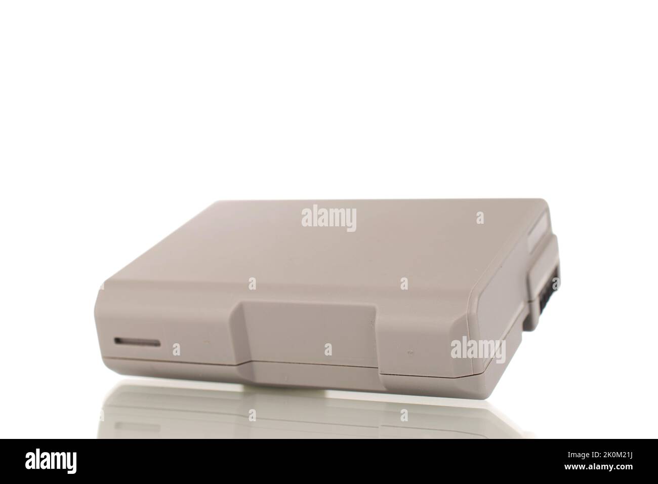 One battery for a camera, close-up, isolated on a white background ...