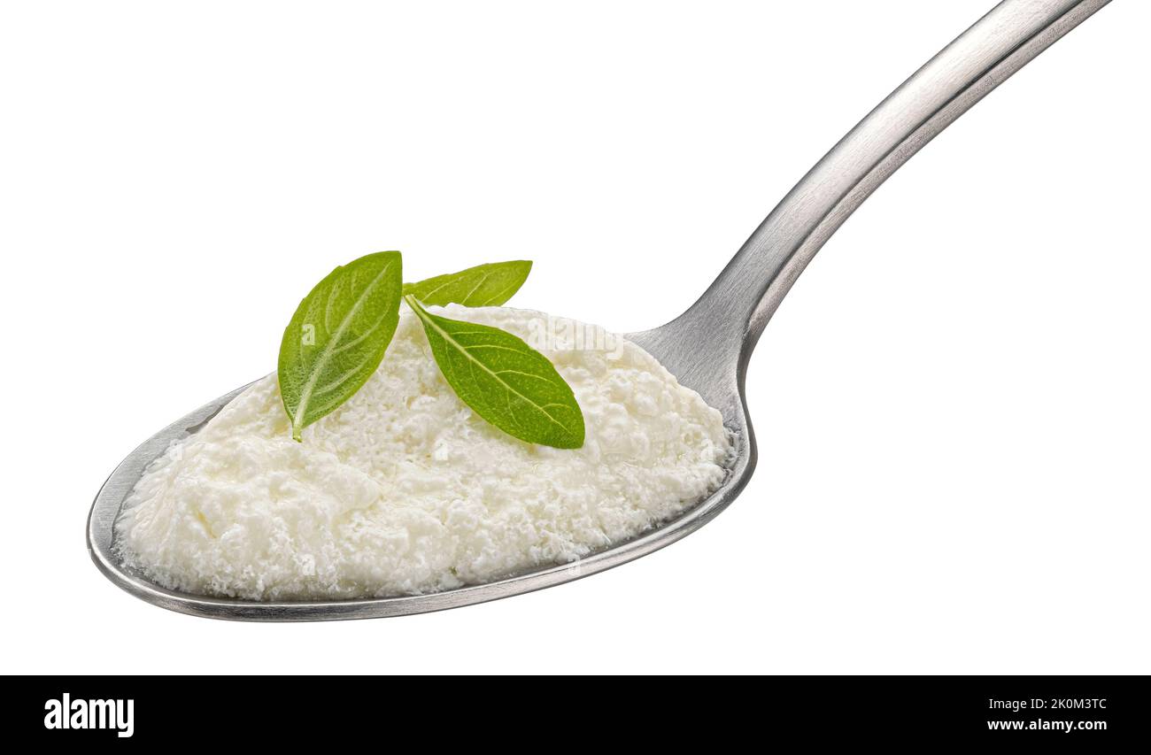 Homemade yogurt in spoon isolated on white background Stock Photo