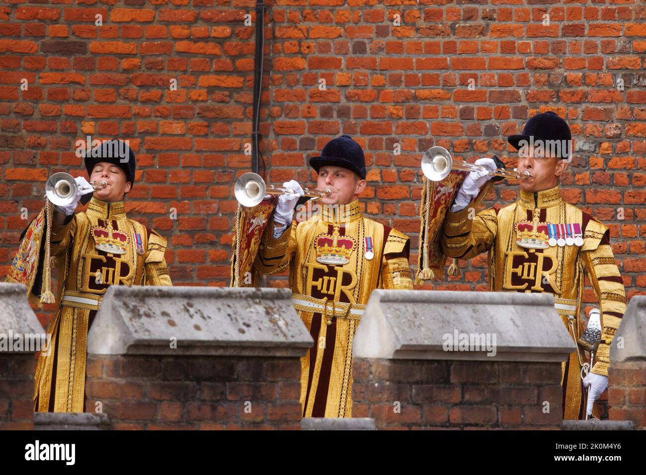 State Trumpeters from the Band of the Household Cavalry are seen ahead of the reading of the Principal Proclamation, from the balcony overlooking Fria Stock Photo