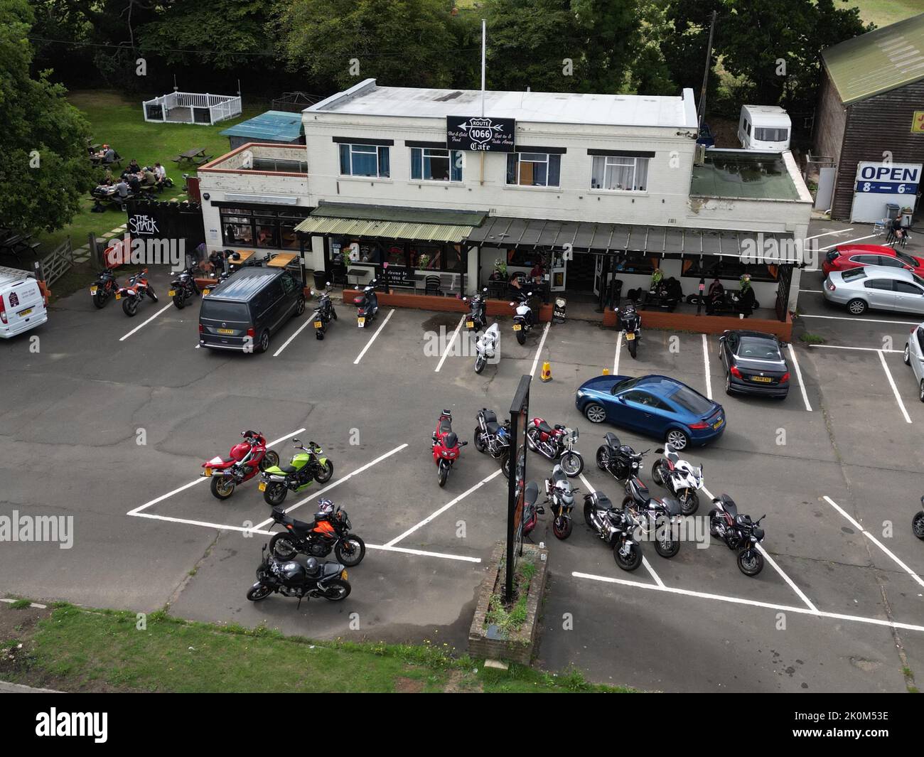 Beautiful view of the Route 1066 Cafe in Robertsbridge, East Sussex full of riders and tourists Stock Photo