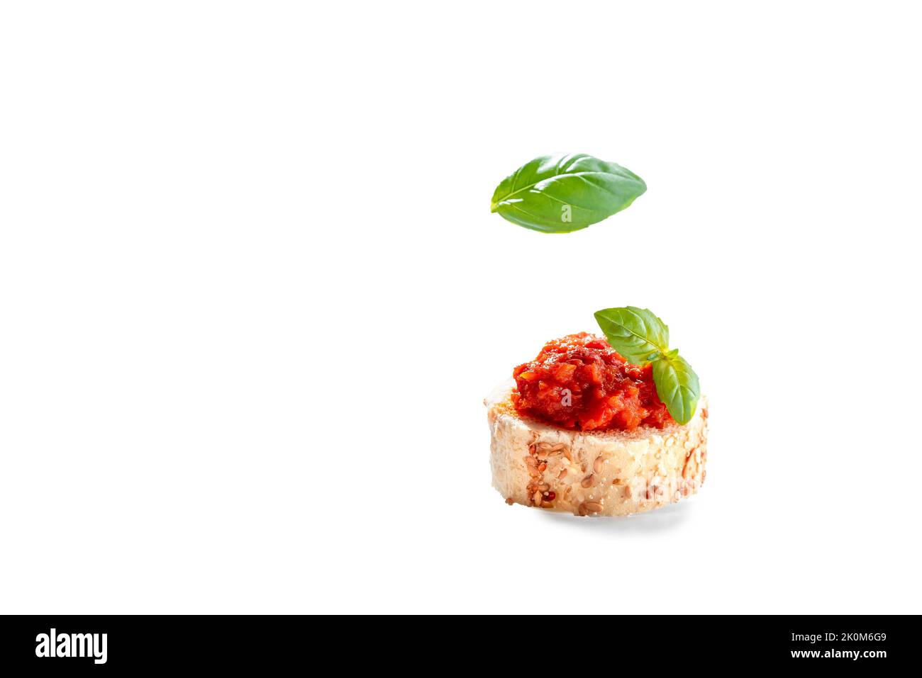 Toast with a paste of roasted red peppers. Ajvar on bread Stock Photo ...