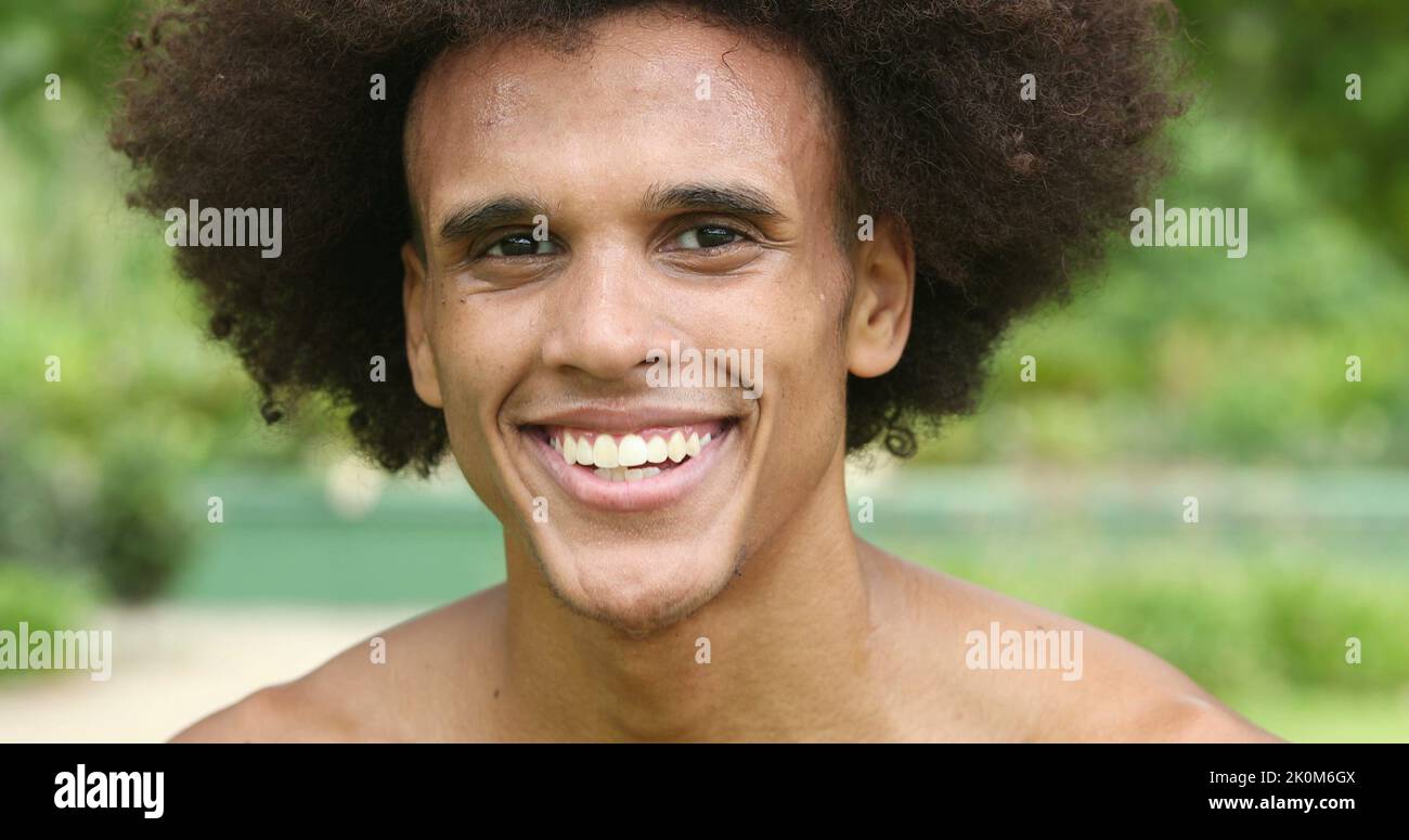 Portrait of attractive handsome young black african man smiling Stock ...