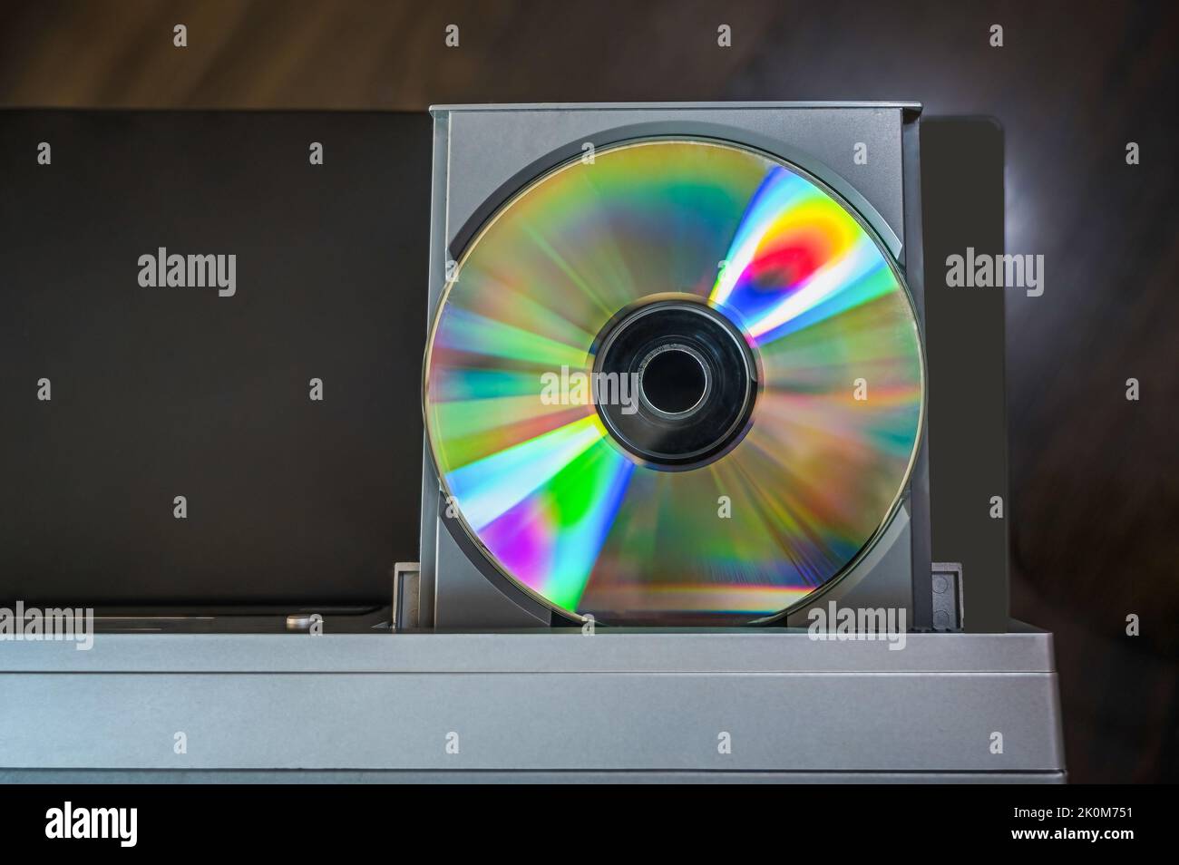 close-up vintage cd player with cd. DVD inserting to video player Stock ...