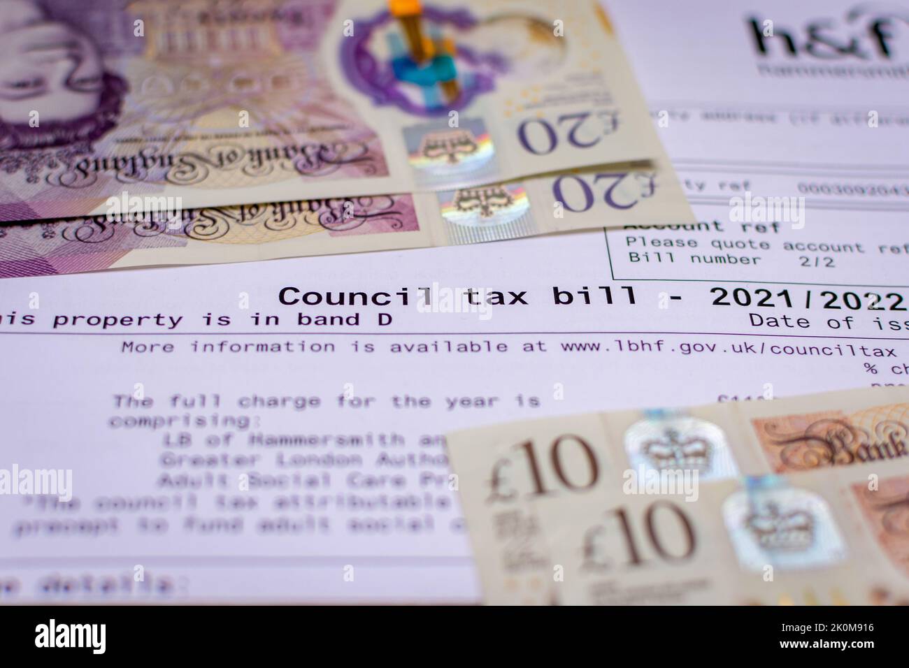 A council tax bill with UK currency. Concept for the cost of living crisis and rising prices in the UK. Stock Photo