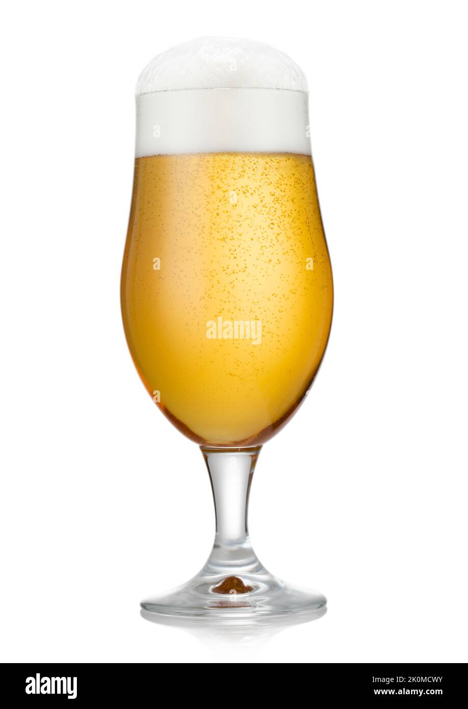 Elegant glass of lager preium beer with foam and bubbles on white. Stock Photo