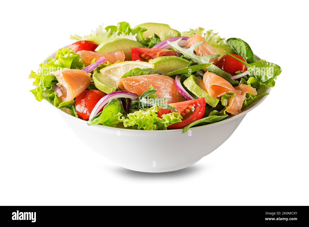 Fresh green lettuce salad with smoked salmon, cherry tomatoes and avocado isolated on white background Stock Photo