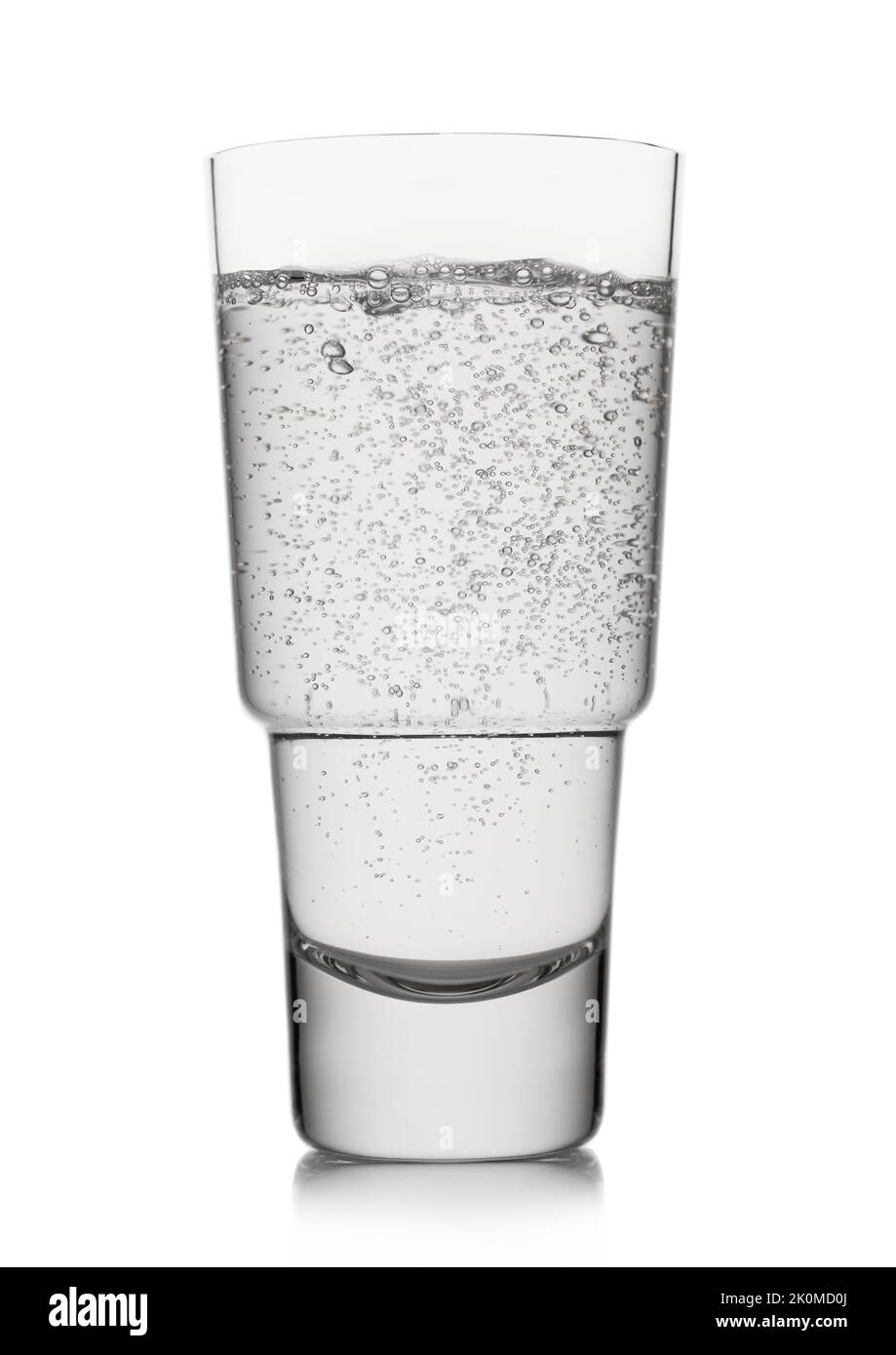 Luxury Glass of natural mineral sparkling water on white. Stock Photo