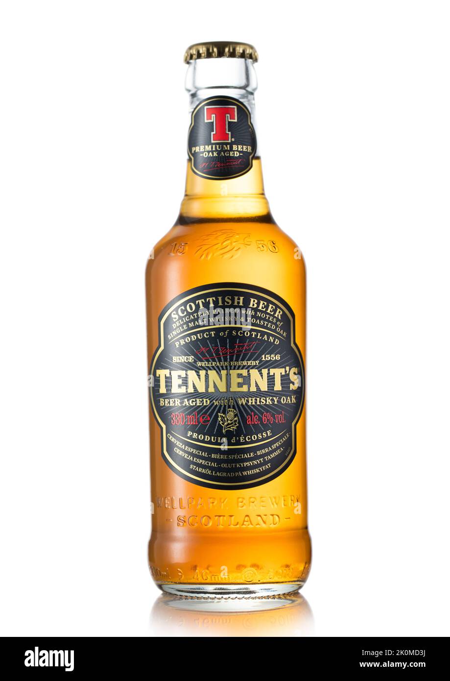LONDON, UK - JULY 01, 2022: Bottle Tennent's beer aged whisky oak on white. Stock Photo