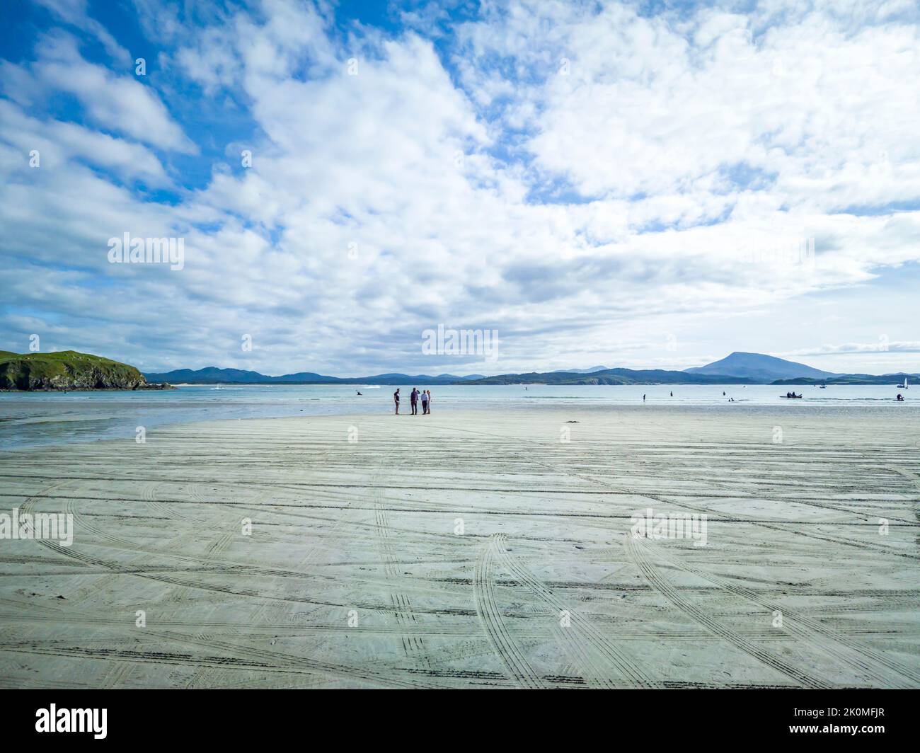 DOWNINGS, COUNTY DONEGAL, IRELAND - AUGUST 18 2022 : The beach is busy during the summer. Stock Photo