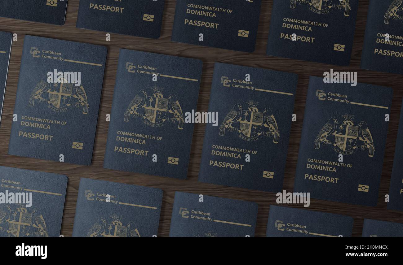 Passport Dominica , Passports of the Caribbean state of New Dominica , top view, on a wooden table Stock Photo
