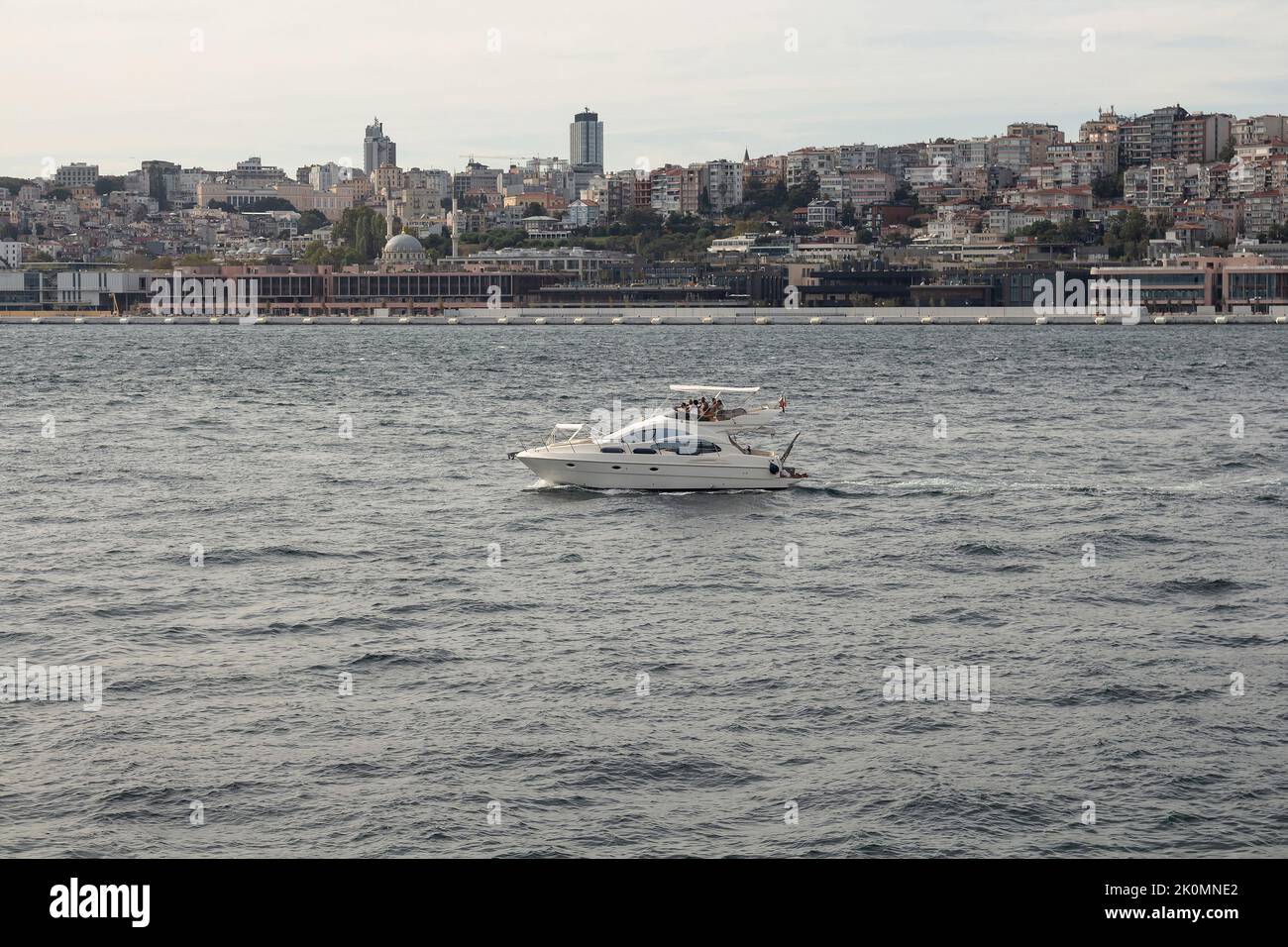 View of a yacht on Bosphorus and Beyoglu district on European side of ...