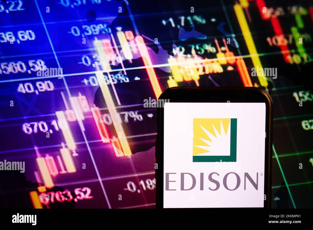 KONSKIE, POLAND - September 10, 2022: Smartphone displaying logo of Edison International company on stock exchange diagram background Stock Photo