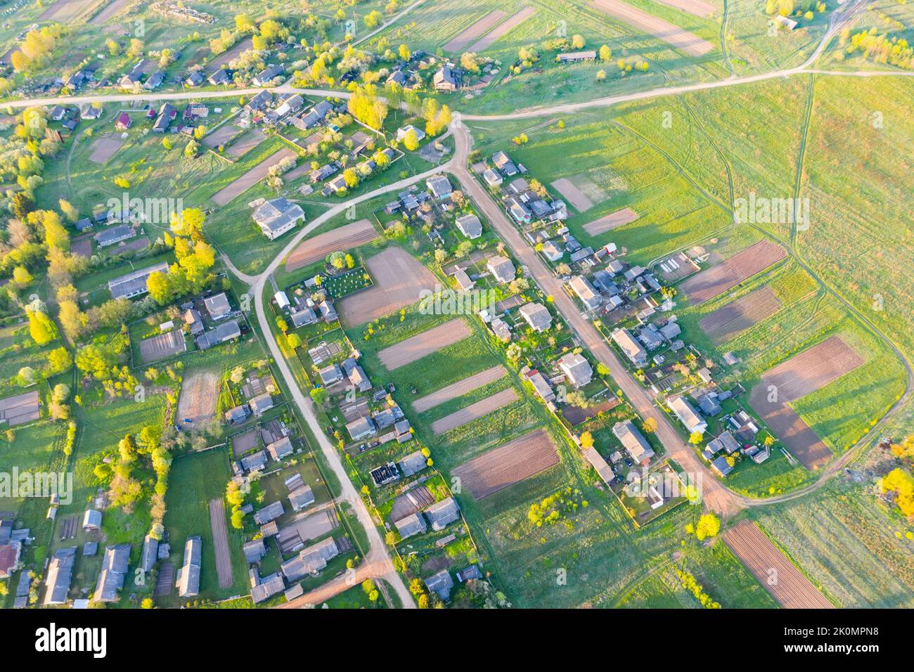 Aerial view of typical village and farm fields Stock Photo
