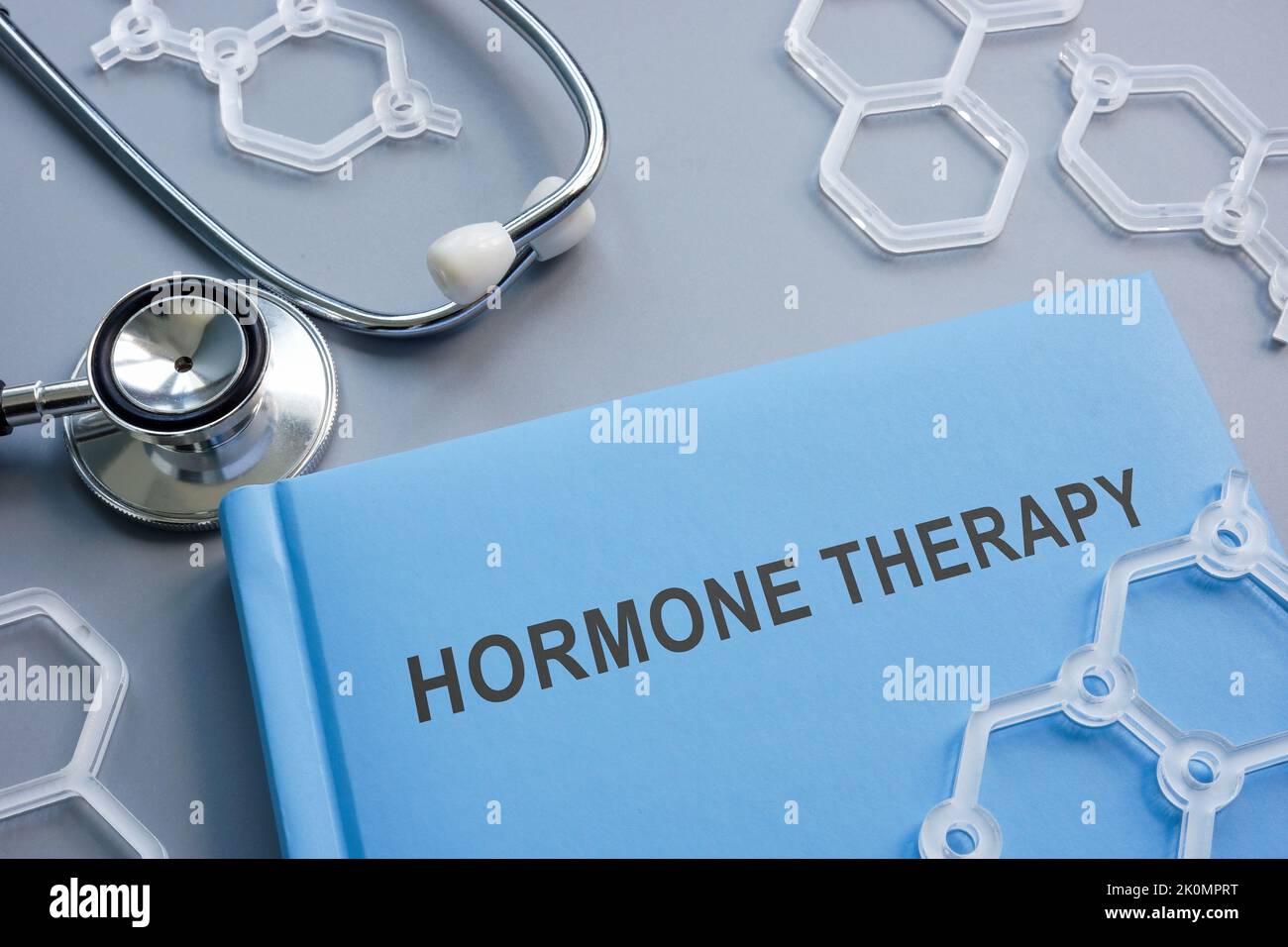 Book hormone therapy and plastic chemical models. Stock Photo