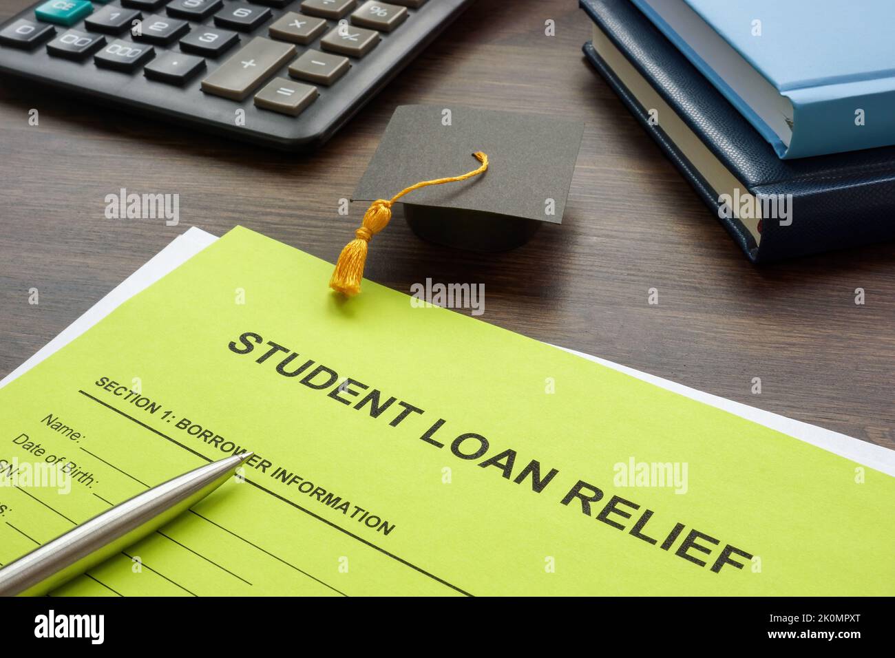 Student loan relief application form and pen. Stock Photo