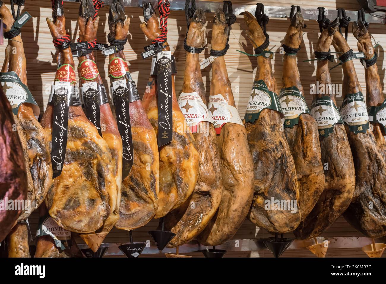 Traditional Spanish jamon ham for sale at the market Stock Photo