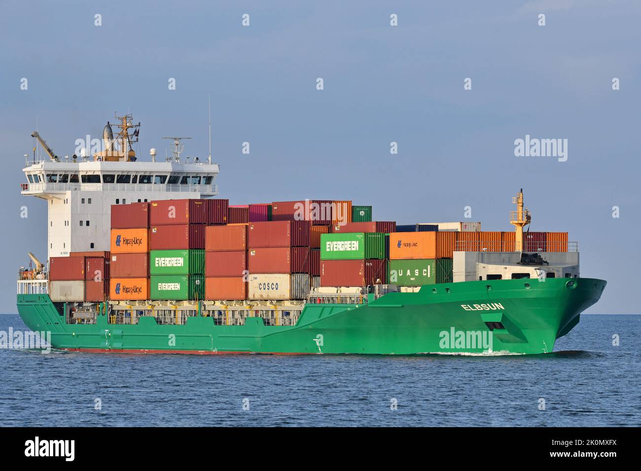 Containership ELBSUn in its new green colours Stock Photo
