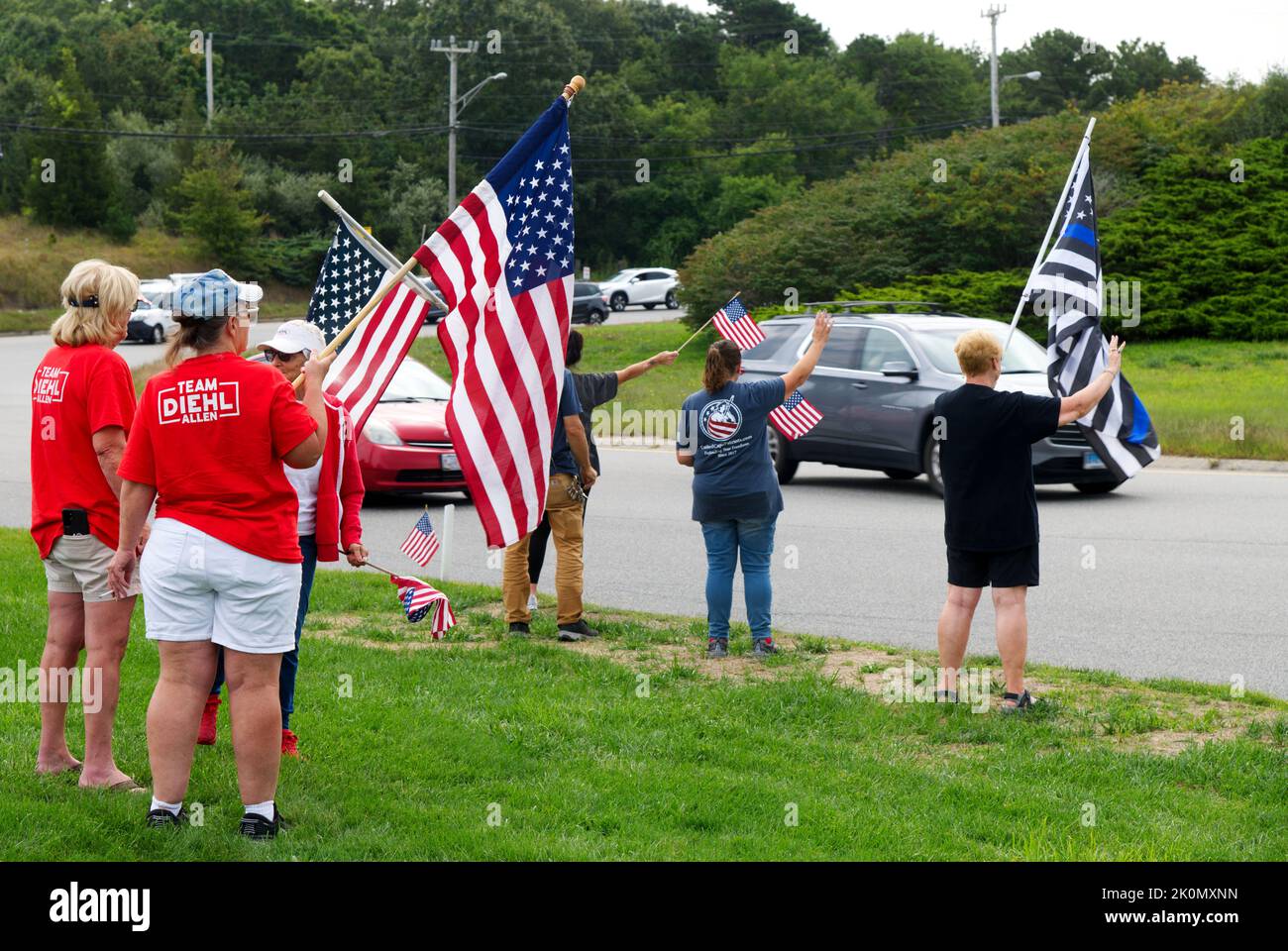 Remembering September 11th - flag waving at the Bourne Rotary on Cape Cod, Massachusetts, USA Stock Photo