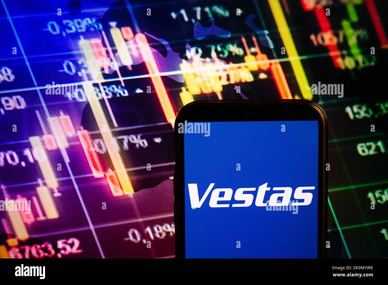 KONSKIE, POLAND - September 10, 2022: Smartphone displaying logo of Vestas Wind Systems company on stock exchange diagram background Stock Photo
