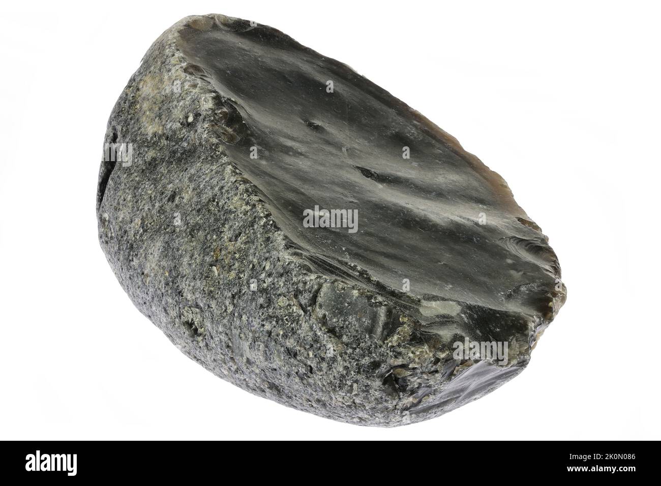 black flint from the Baltic Sea coast in Waabs, Germany isolated on white background Stock Photo