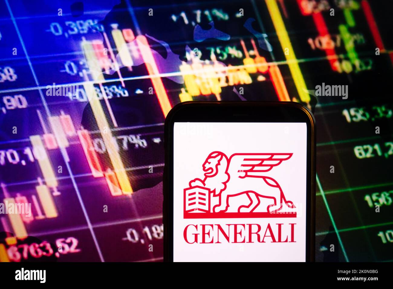 KONSKIE, POLAND - September 10, 2022: Smartphone displaying logo of Generali company on stock exchange diagram background Stock Photo