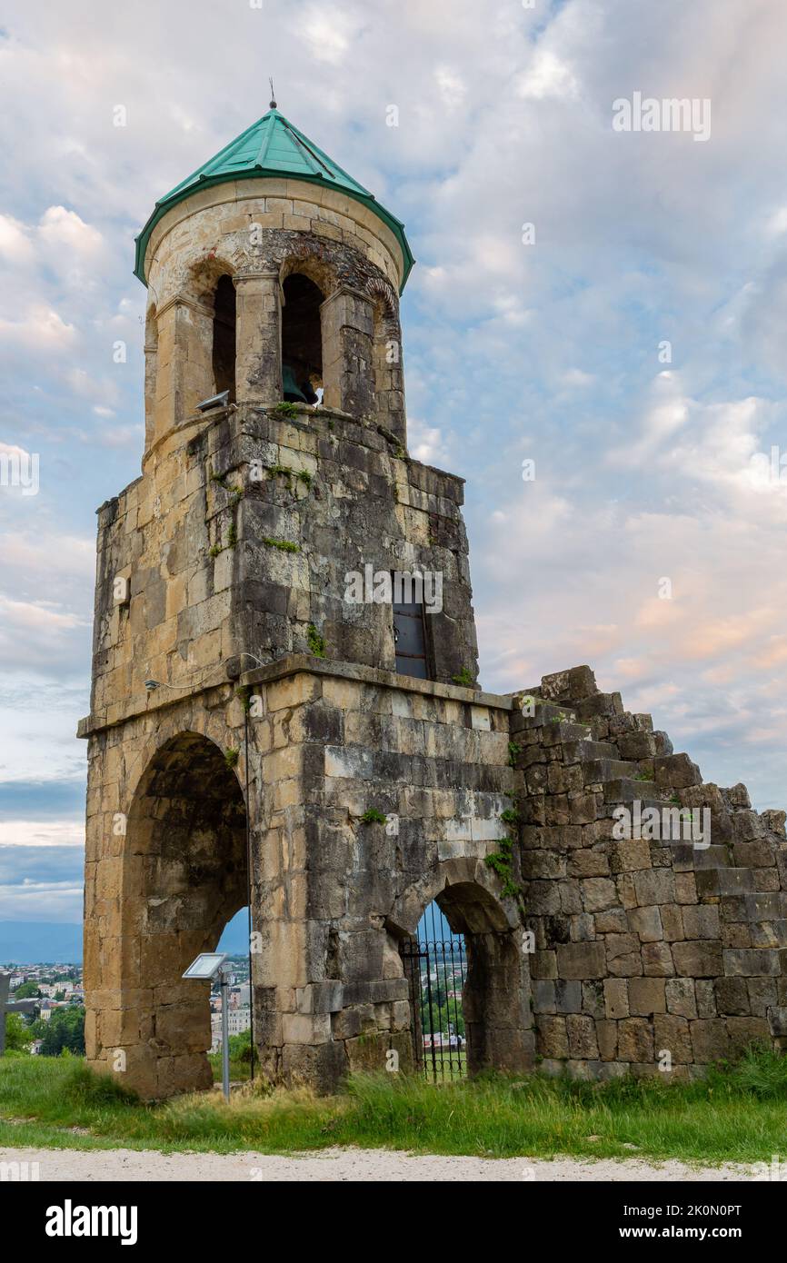 Belfry tower of Bagrati Cathedral (Kutaisi Cathedral), XI-century monastery, example of Georgian architecture with stone walls and turquoise dome, Kut Stock Photo