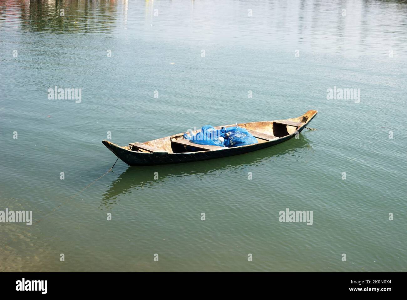 Thai dugout boat (log canoe) with nets, Individual fishing Stock Photo