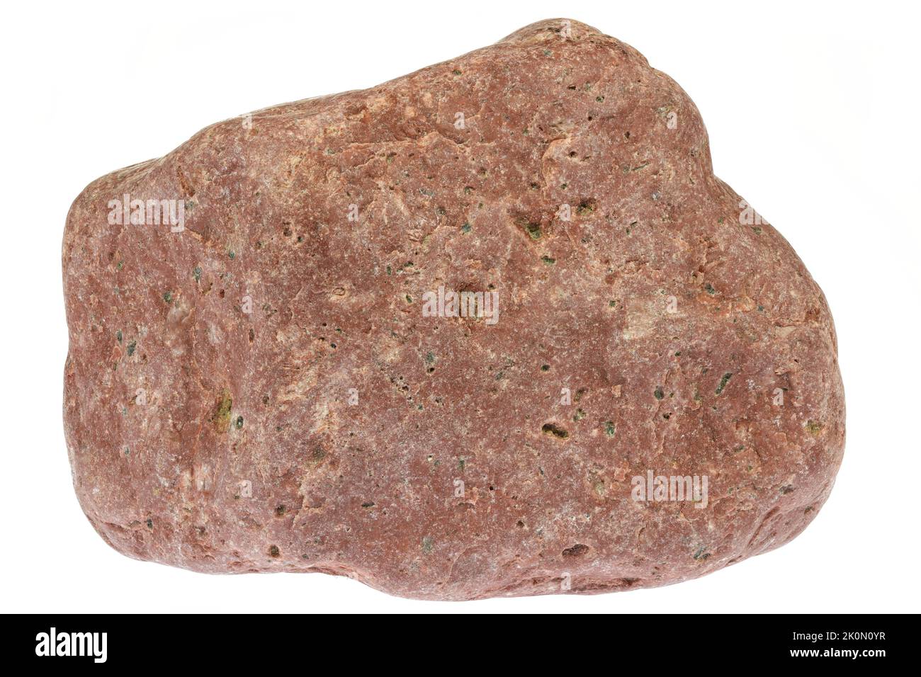 rhyolite from the Baltic Sea coast in Waabs, Germany isolated on white background Stock Photo
