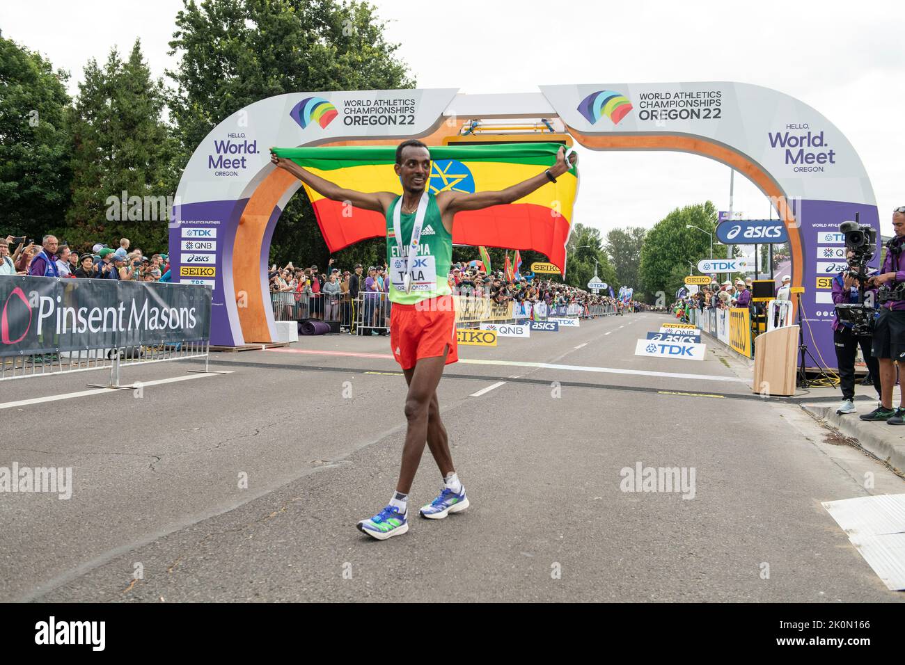 Tamirat Tola of Ethiopia celebrating after winning the men’s marathon at the World Athletics