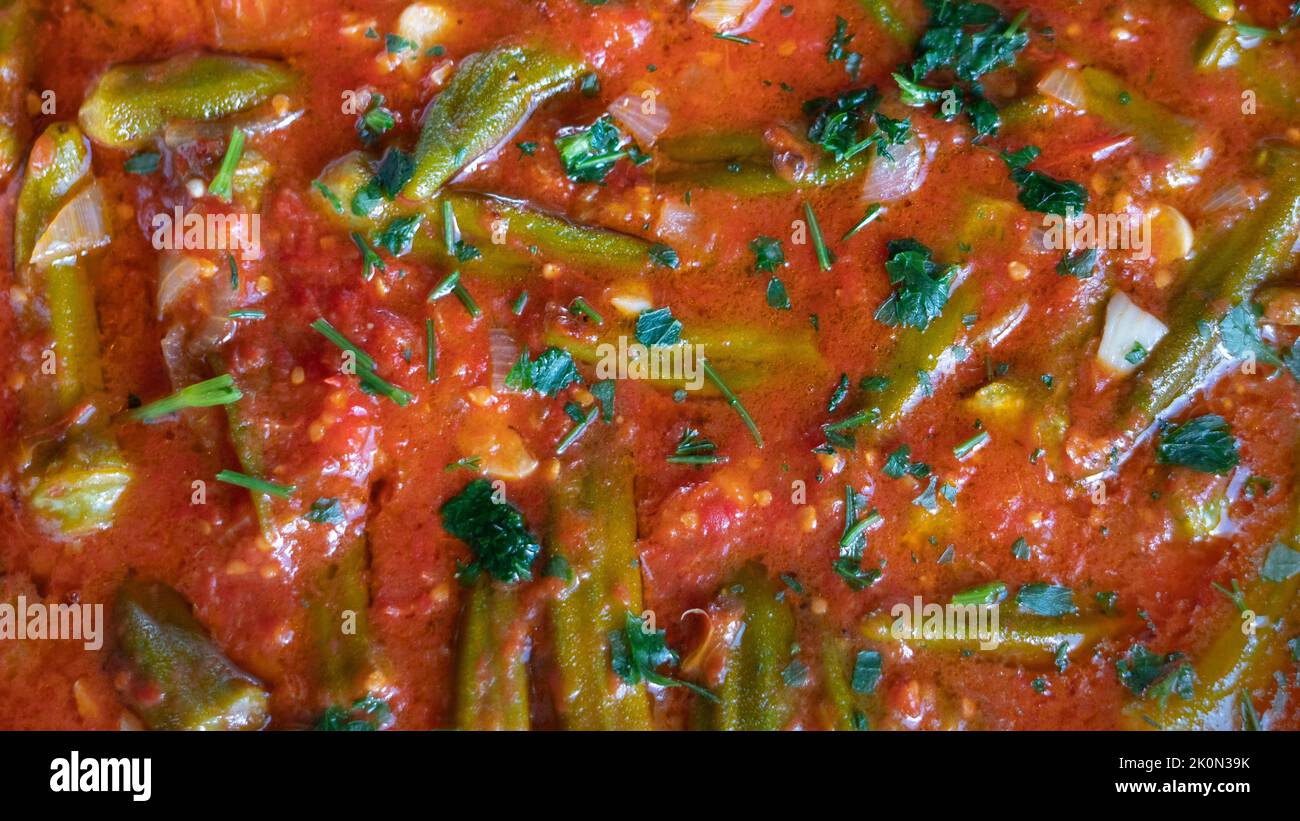 Top view of stewed okra (known as gumbo or ladies' fingers) main dish