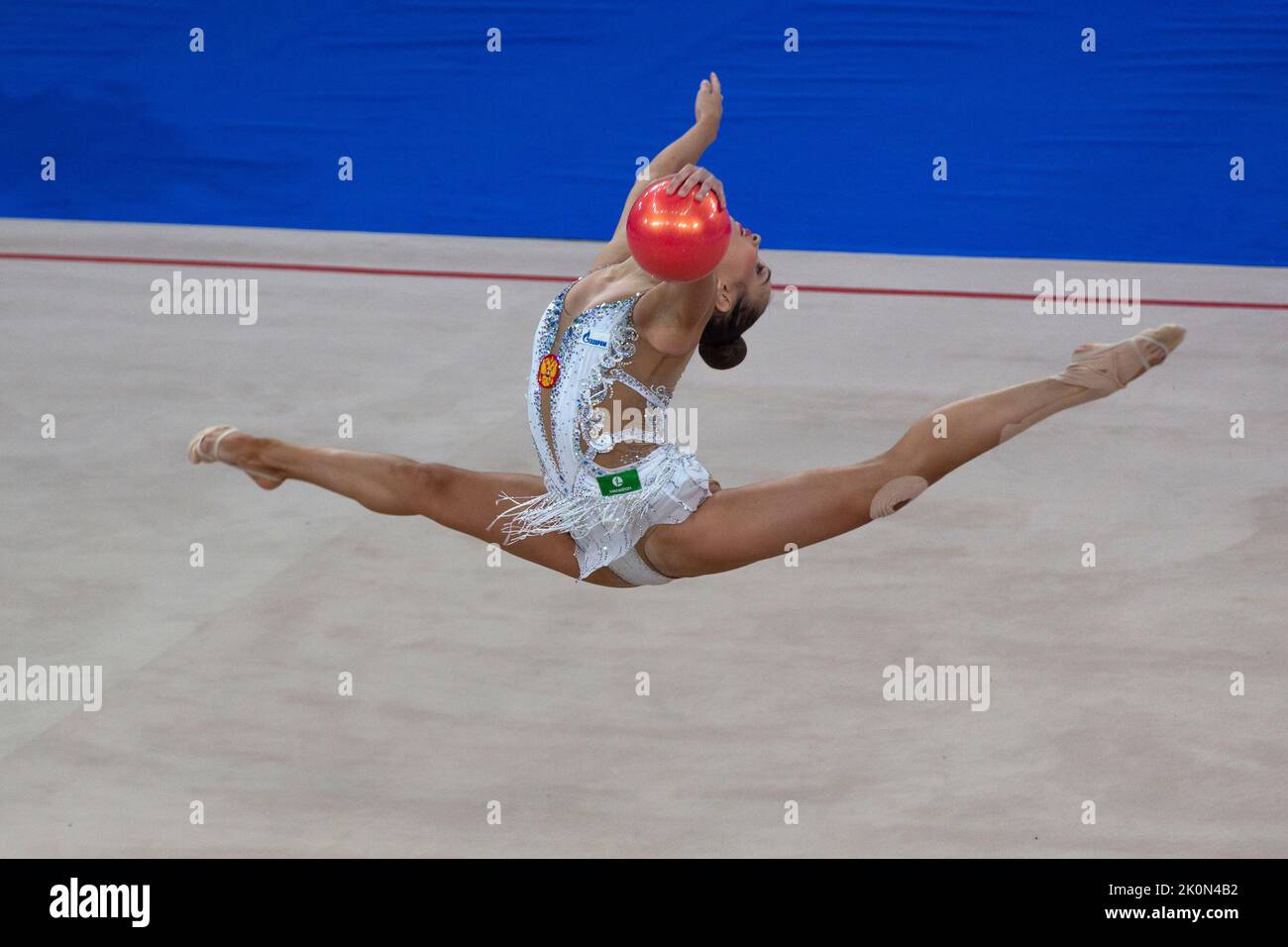 Moscow, Russia. 12th of September, 2022. Sofya Agafonova performs her ball routine in a qualification at the 2022 All-Russian Summer Spartakiad in Rhythmic Gymnastics at Irina Viner-Usmanova Gymnastics Palace in Luzhniki in Moscow, Russia. Nikolay Vinokurov/Alamy Live News Stock Photo